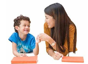 Kindergarten student and female adult