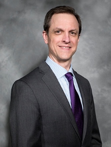 Kevin Tomlinson, Director