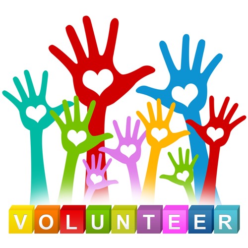 hands raised high above the word volunteer 