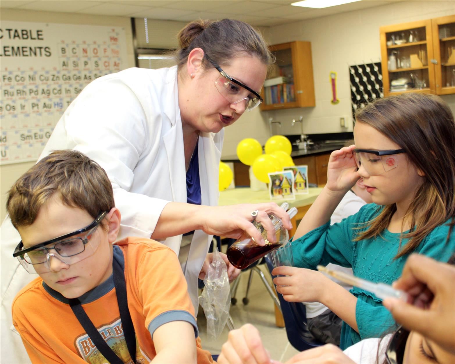 science teacher with students 