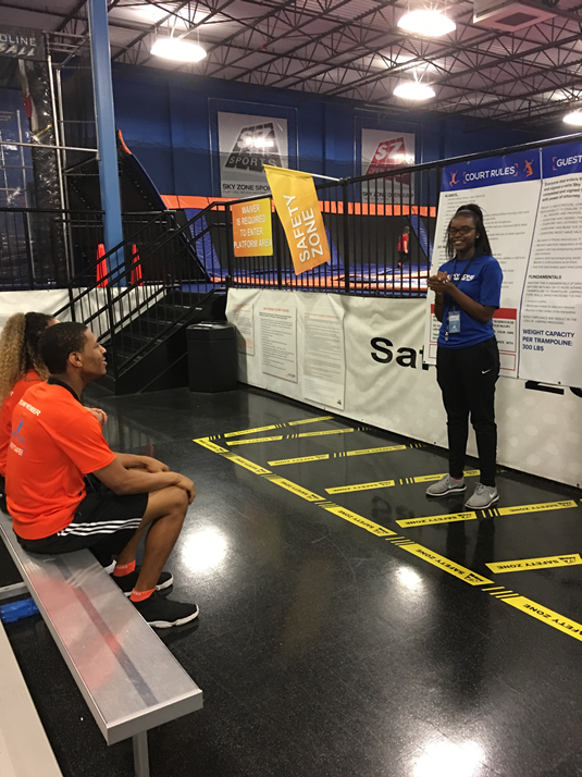 Student presenting to other students